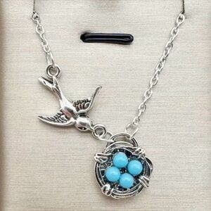 Charming Silver Bird Necklace with Turquoise Accents